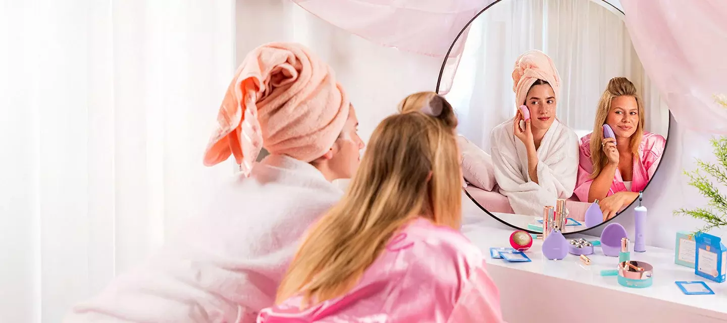 Girlfriends enjoying a spa day at home celebrating Global Wellness Day 